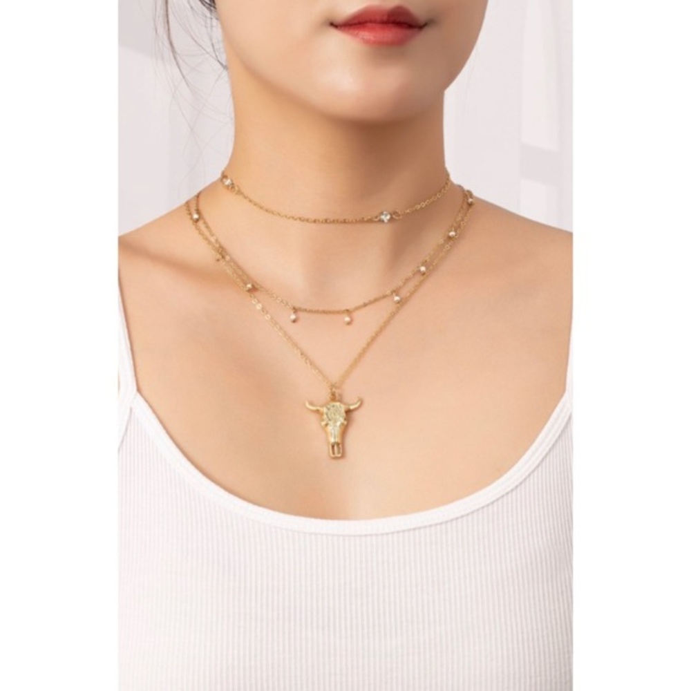 Layered cow skull necklace